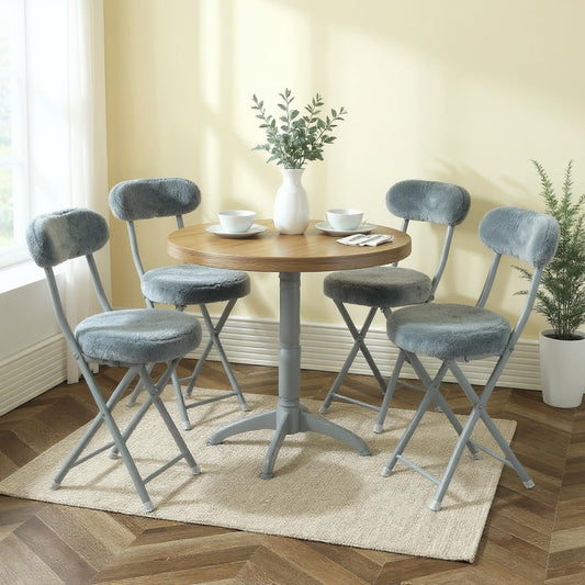 Set de quatre chaises pliantes grises avec revetement effet fourrure douce, cadre metal et style nordique