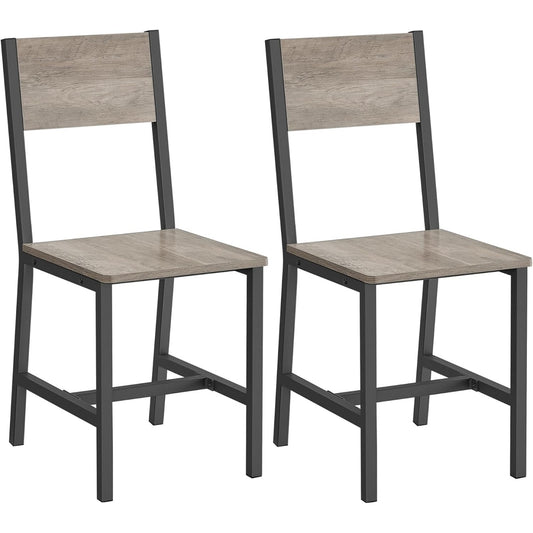 Paire de chaises industrielles avec structure acier et tissu beige gris, confortables pour repas et salon